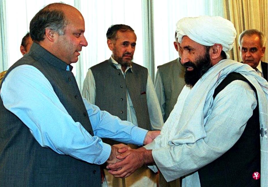 穆罕默德·哈桑·阿洪德（右）1999年在伊斯兰堡与时任巴基斯坦总理谢里夫（左）会面 ...